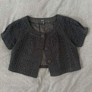 Nicole by Nicole Miller black cropped eyelet jacket in size 4. EUC.